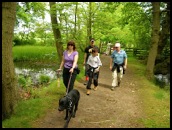 Tom the dog accompanied by Lisa, Geoff, Michael and Jez, on route to Packwood House .