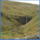 A trickle from the biggest waterfall seen on the way up Whernside .