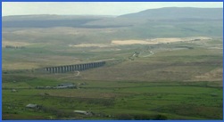 One of the many views of the Ribblehead Viaduct enjoyed from the slopes of Whernside .